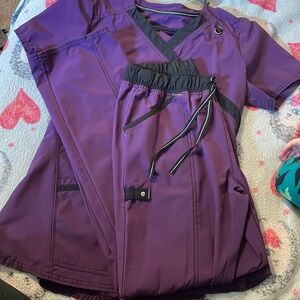 Scrub set, scrubstar, both are a small